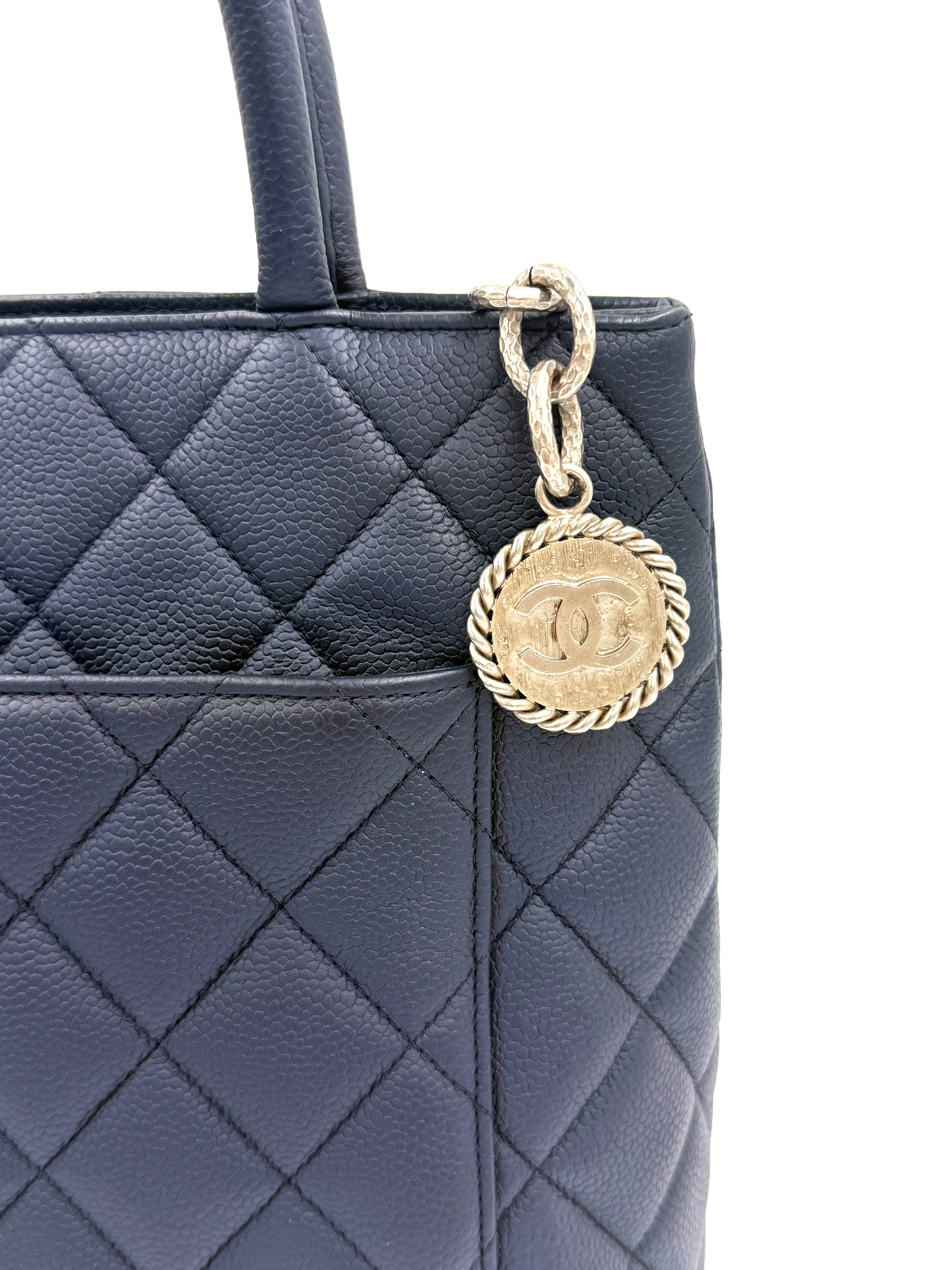 Pre-Owned Chanel Quilted Caviar Leather Navy Medallion Tote with Silver Hardware - Authenticated