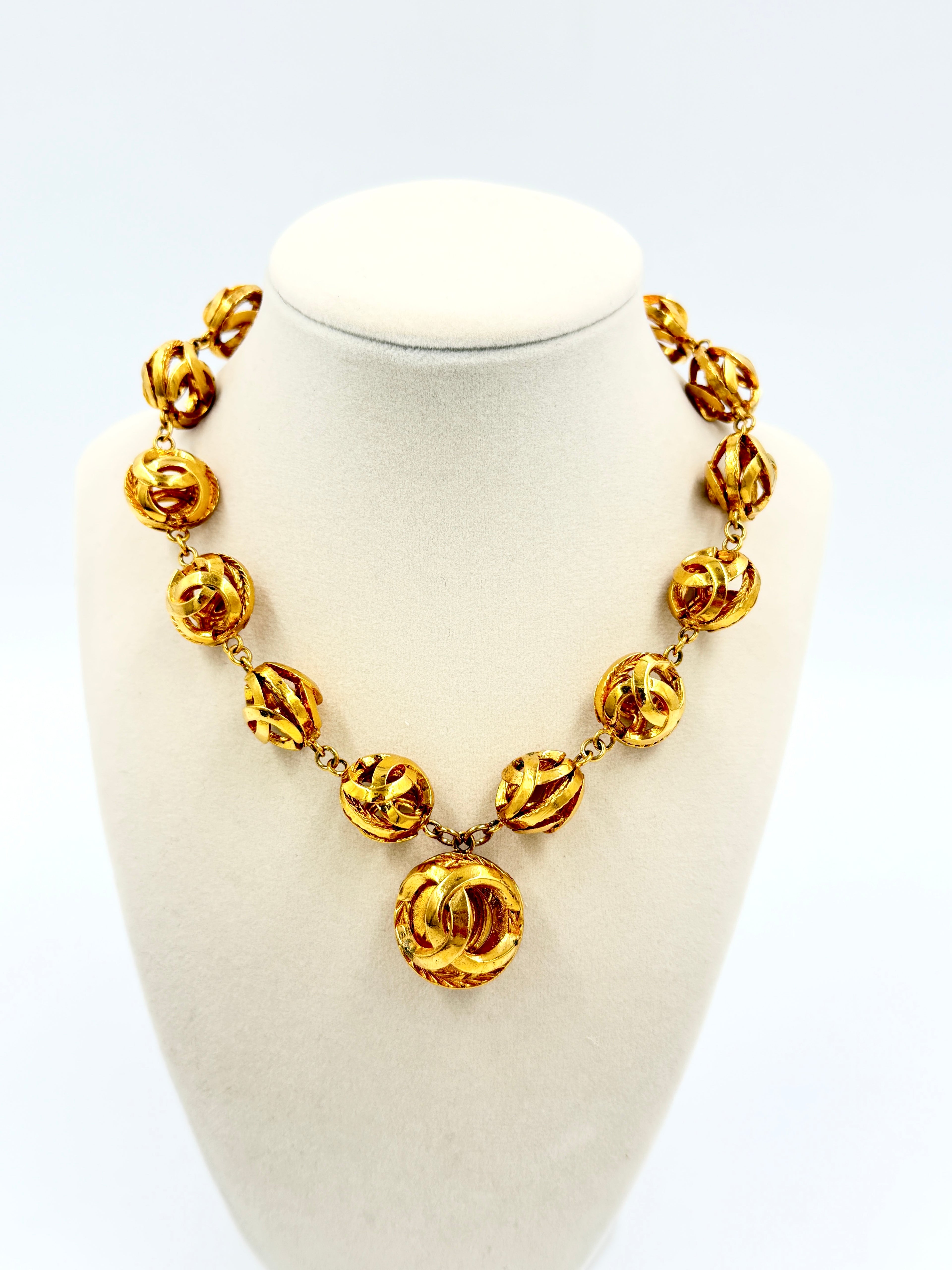 Pre-Owned Chanel Vintage Coco Mark Necklace Gold Plated Cage Orb Beads CC Logo Pendant - Authenticated