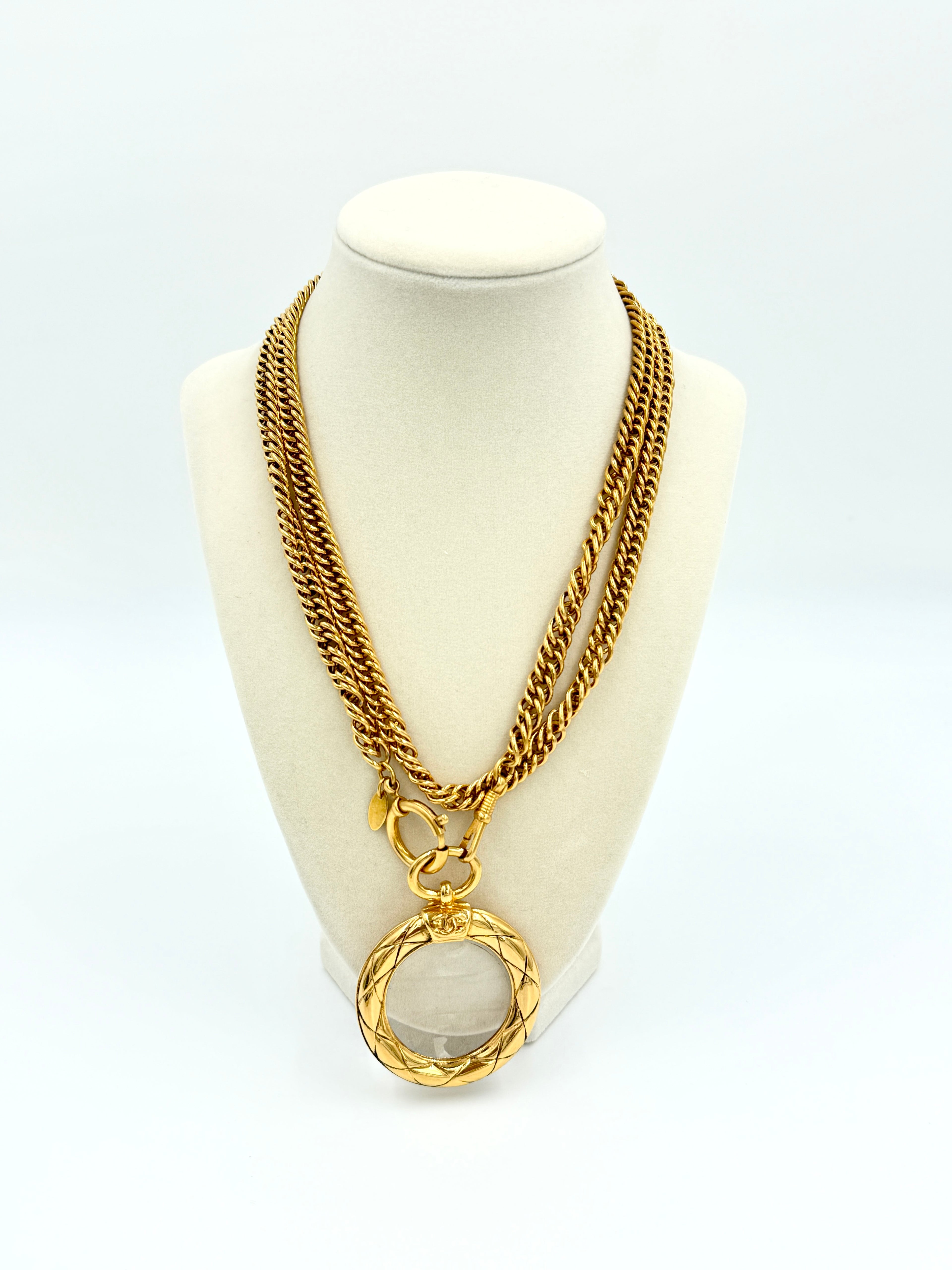 Pre-Owned Chanel Quilted CC Magnifying Glass Pendant Necklace 24k Gold Plated 37" - Authenticated