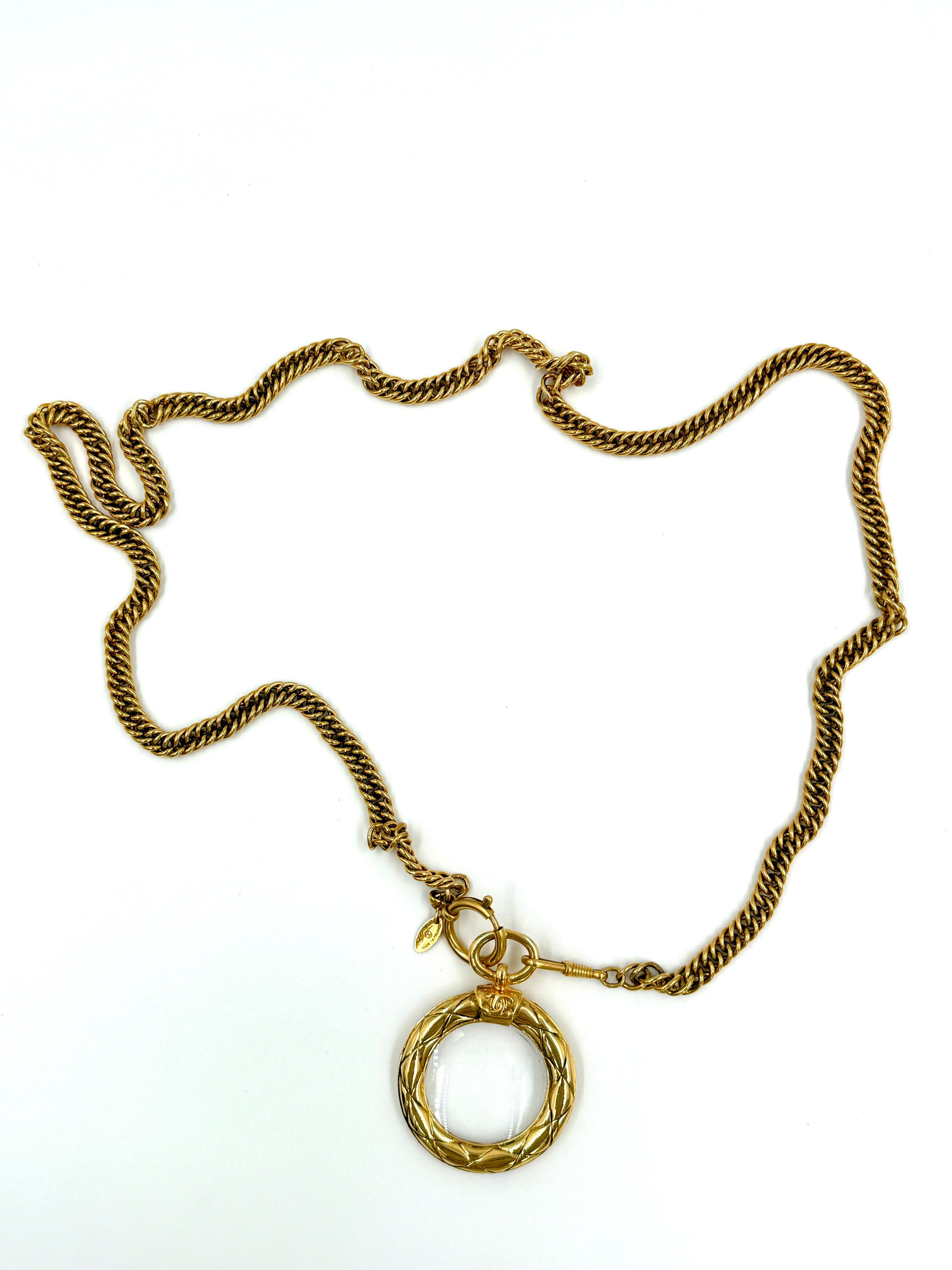 Pre-Owned Chanel Quilted CC Magnifying Glass Pendant Necklace 24k Gold Plated 37" - Authenticated