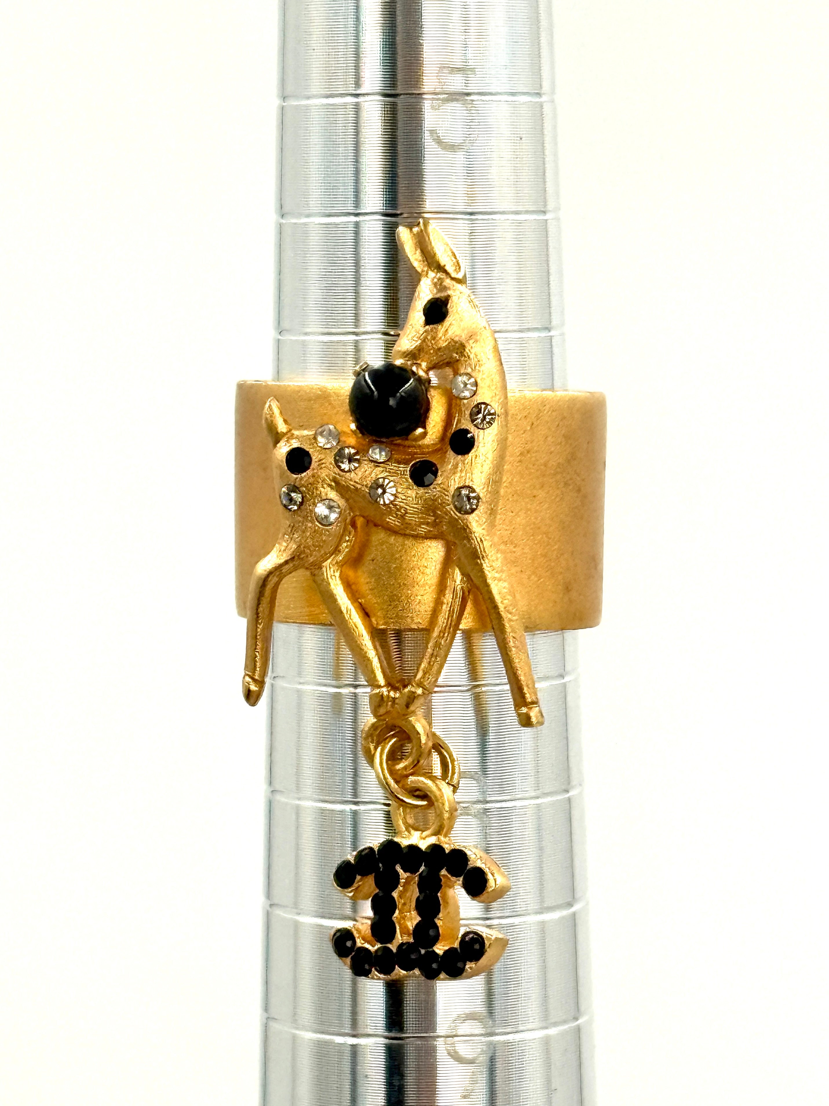 Pre-Owned Chanel CC Logo Gold Band Ring Size 7 Black Clear Rhinestone Deer Dangling CC - Authenticated