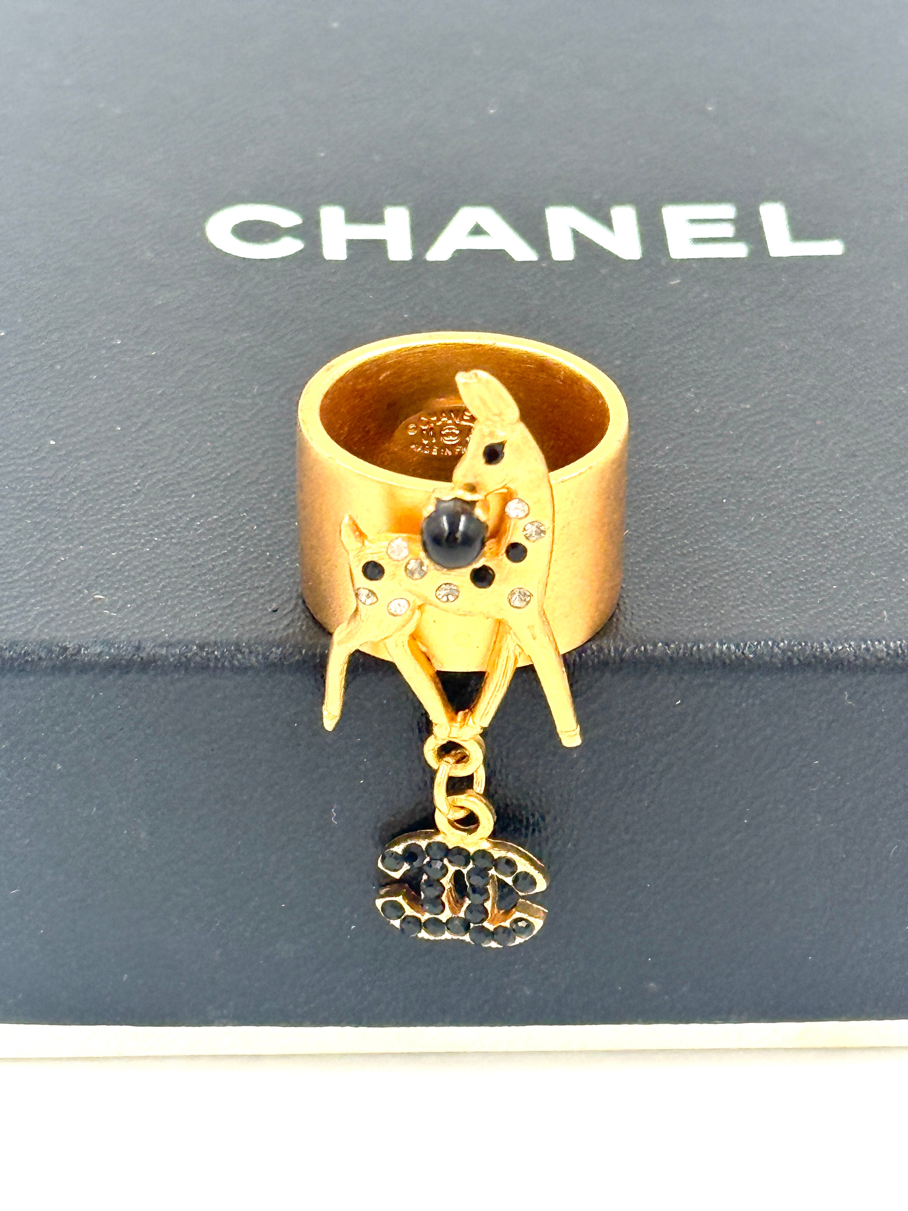 Pre-Owned Chanel CC Logo Gold Band Ring Size 7 Black Clear Rhinestone Deer Dangling CC - Authenticated