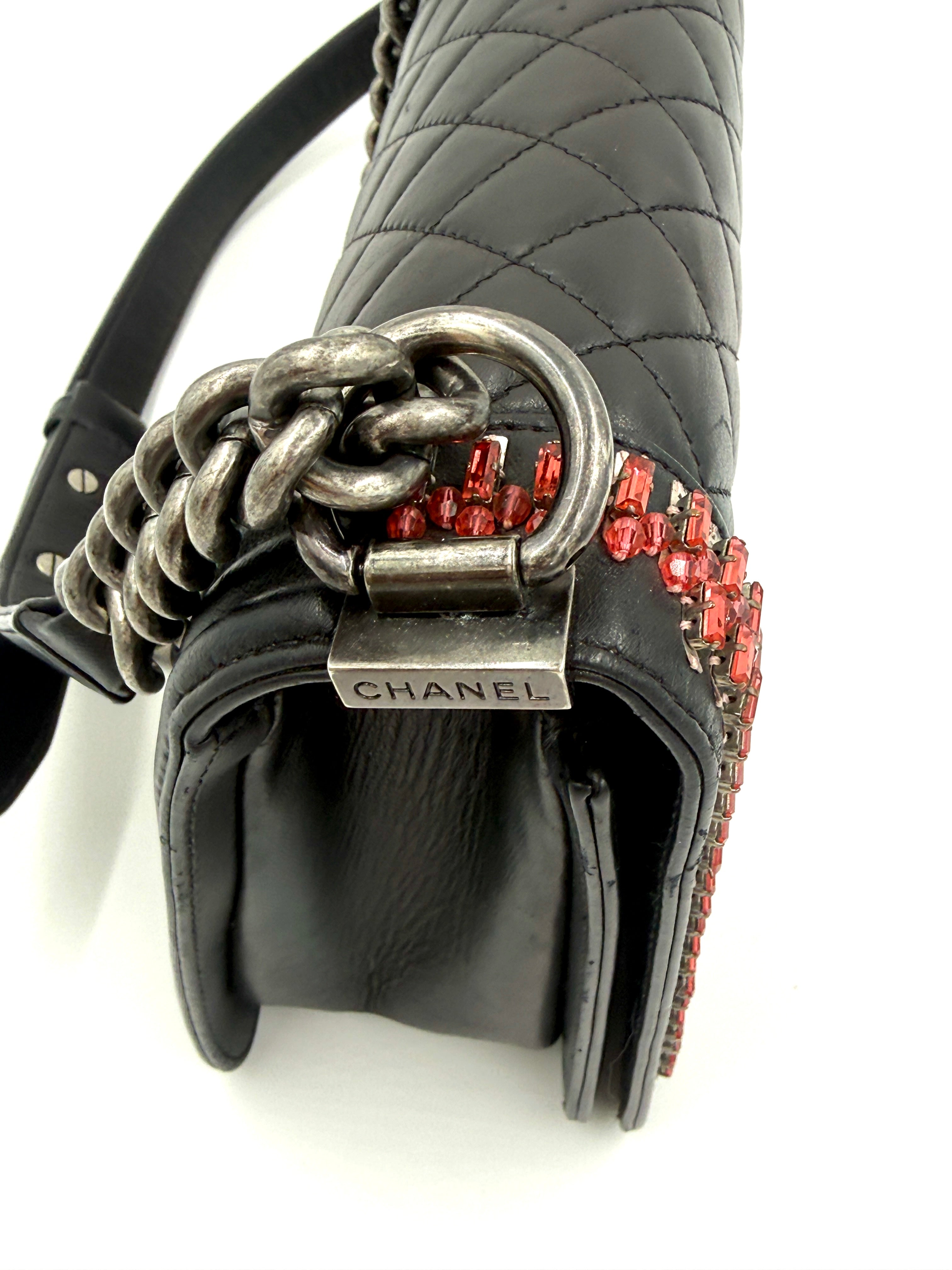Pre-Owned CHANEL Black Lambskin Medium Boy Bag with Red Crystals - Authenticated